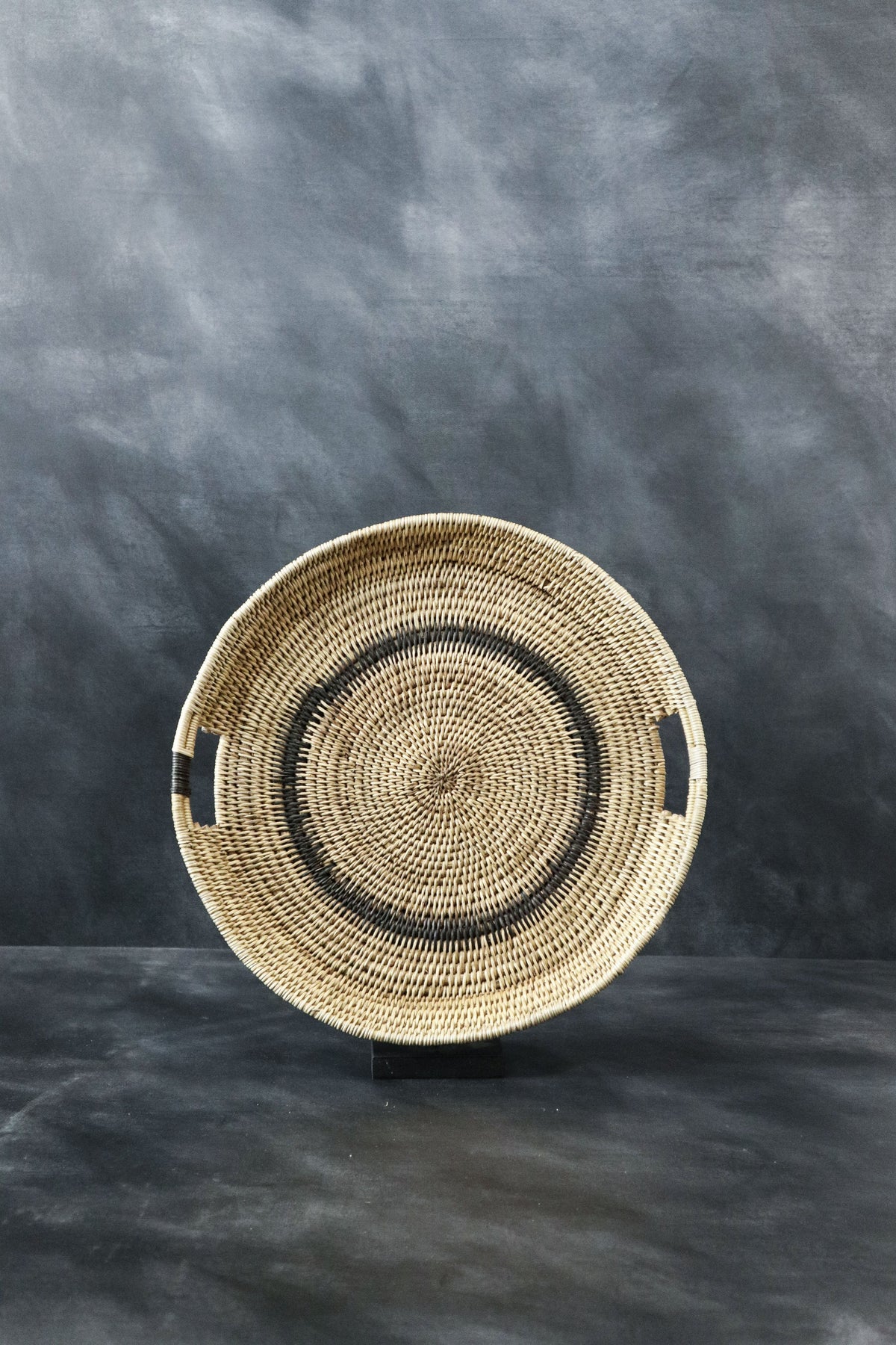 Handwoven Makenge root tray from Zambia