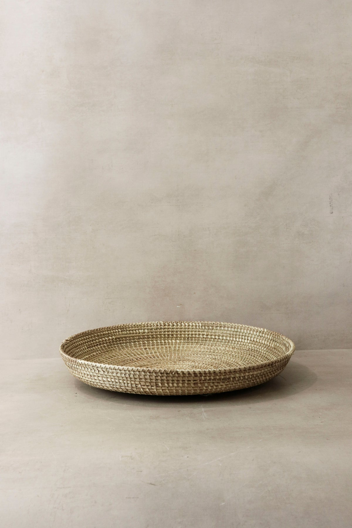 Handmade natural woven tray from Senegal, view 2